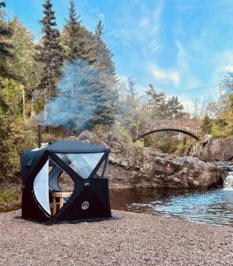 wood fired tent sauna by the water