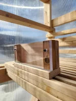 Artistic image of the sauna phone case placed elegantly on a sauna bench, capturing its natural beauty