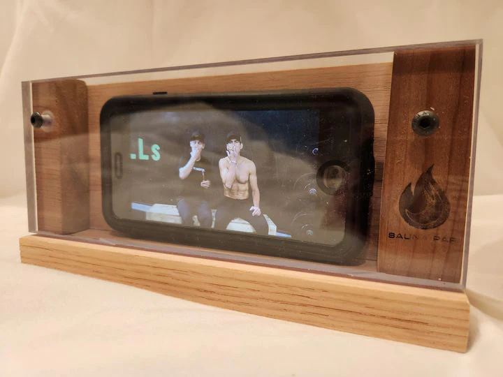 Sauna phone case displaying a phone playing a guided breathing session led by the founders