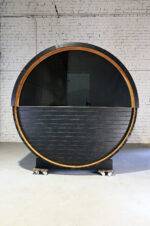 Thermory Ignite Barrel Sauna from back with large panoramic window