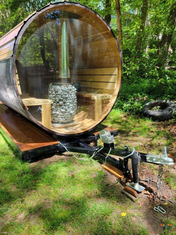 Panoramic window barrel sauna on a trailer